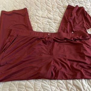 Susan Graver liquid knit pull on pants NWOT, but does have the spare button.